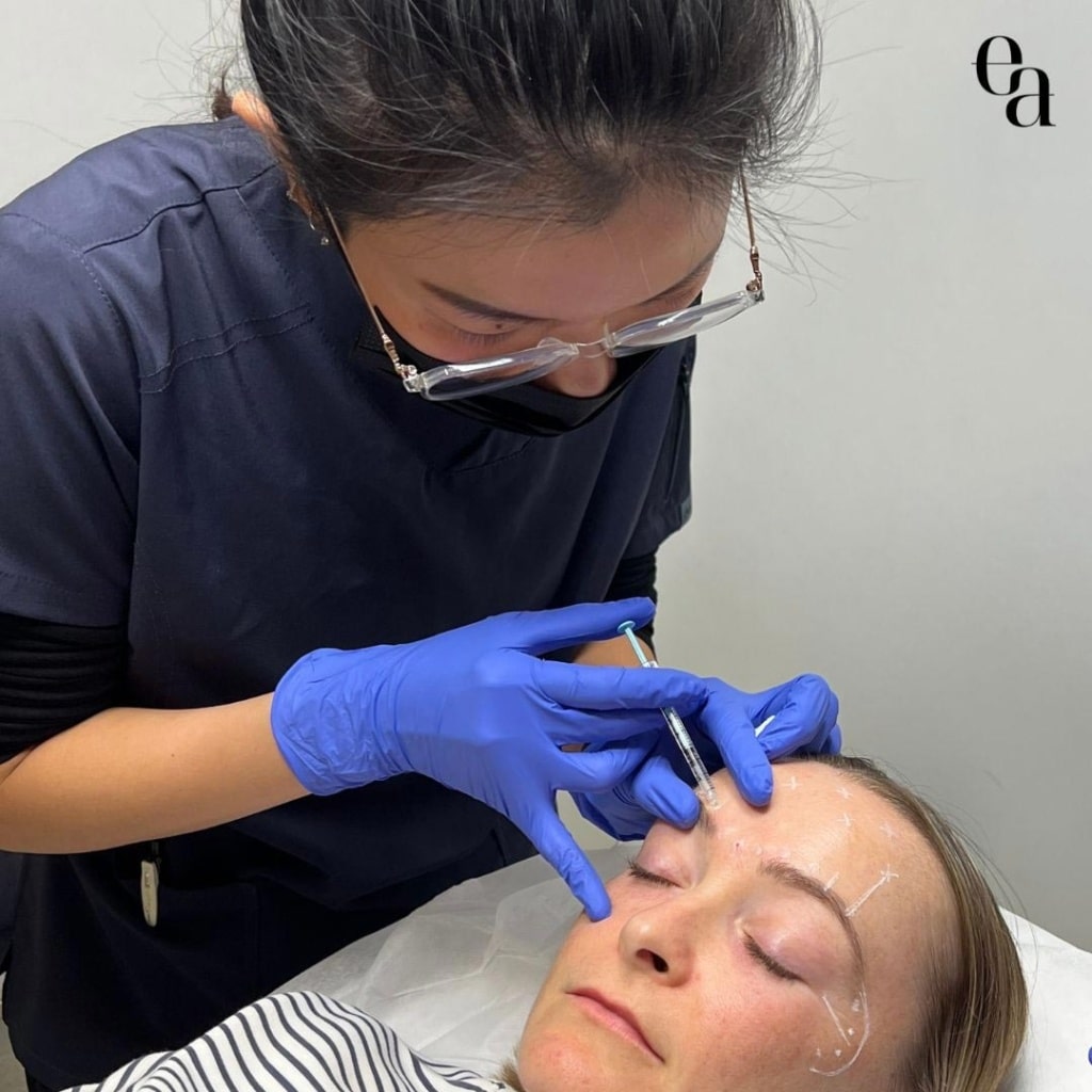 Woman Learning How To Properly Use An Injection